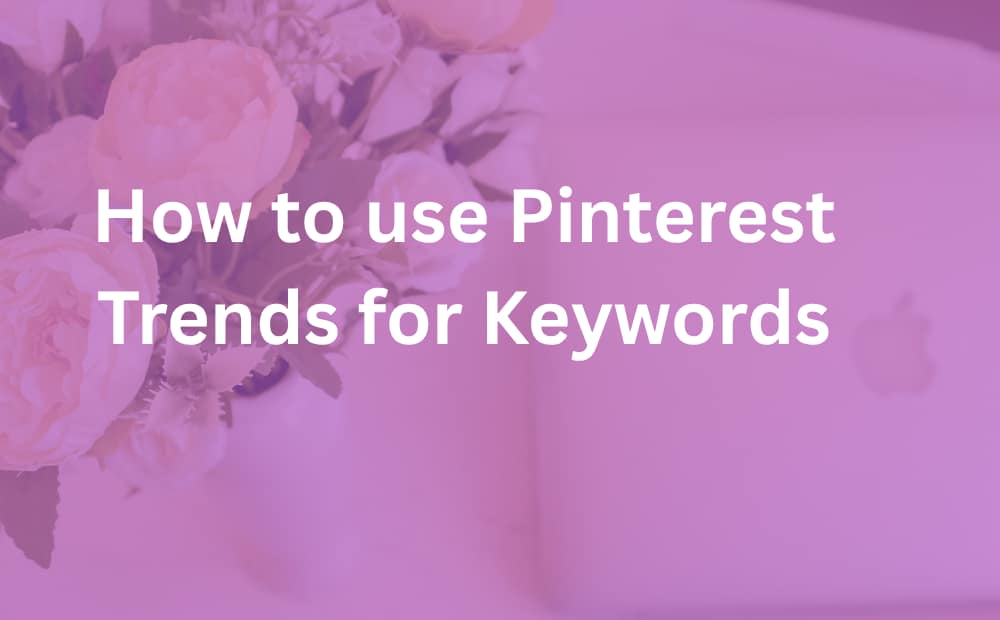 Pink floral Pinterest graphic with white text reading “How to use Pinterest Trends for Keywords,” presenting a soft, informative tone.